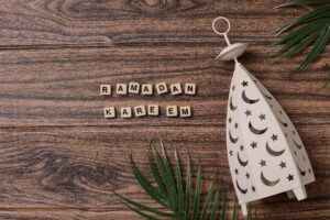 Ramadan kareem on wooden background
